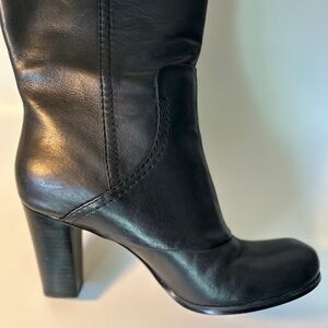 black heeled leather boots